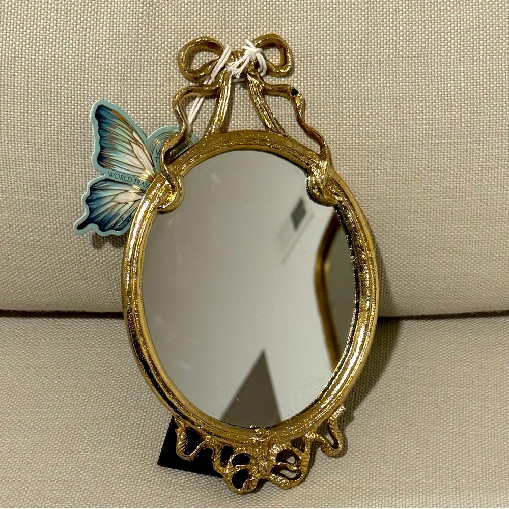 1/ Gold Bow Framed Mirror/ made in India 
10”x5.5”